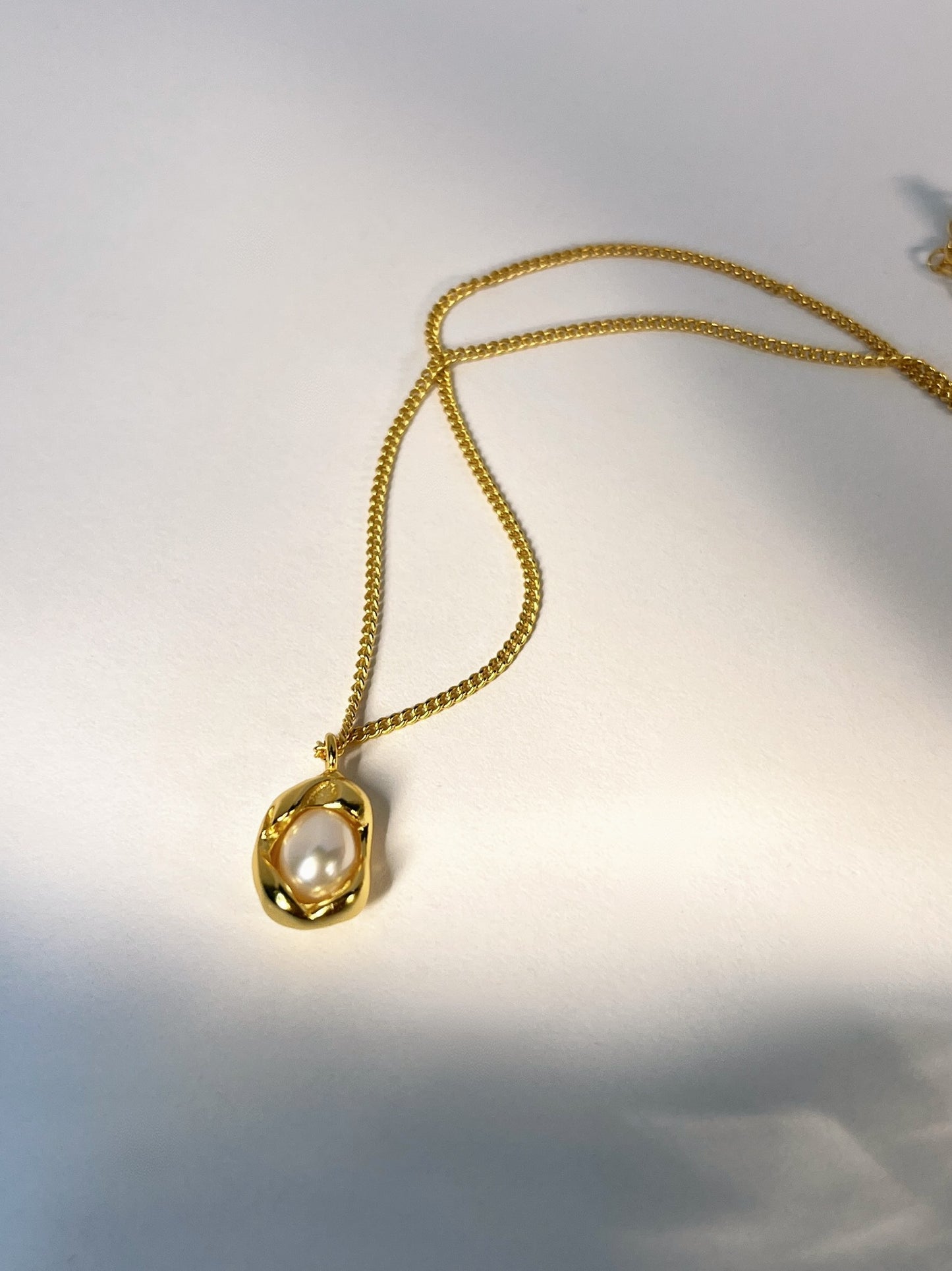 Le collier de sculpture de perles