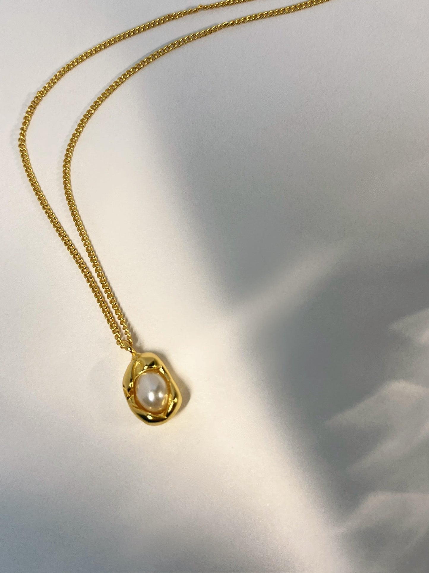 Le collier de sculpture de perles