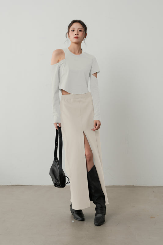 Front pose of The Linear Side Split Skirt in Fog, emphasizing its clean lines and modern silhouette.