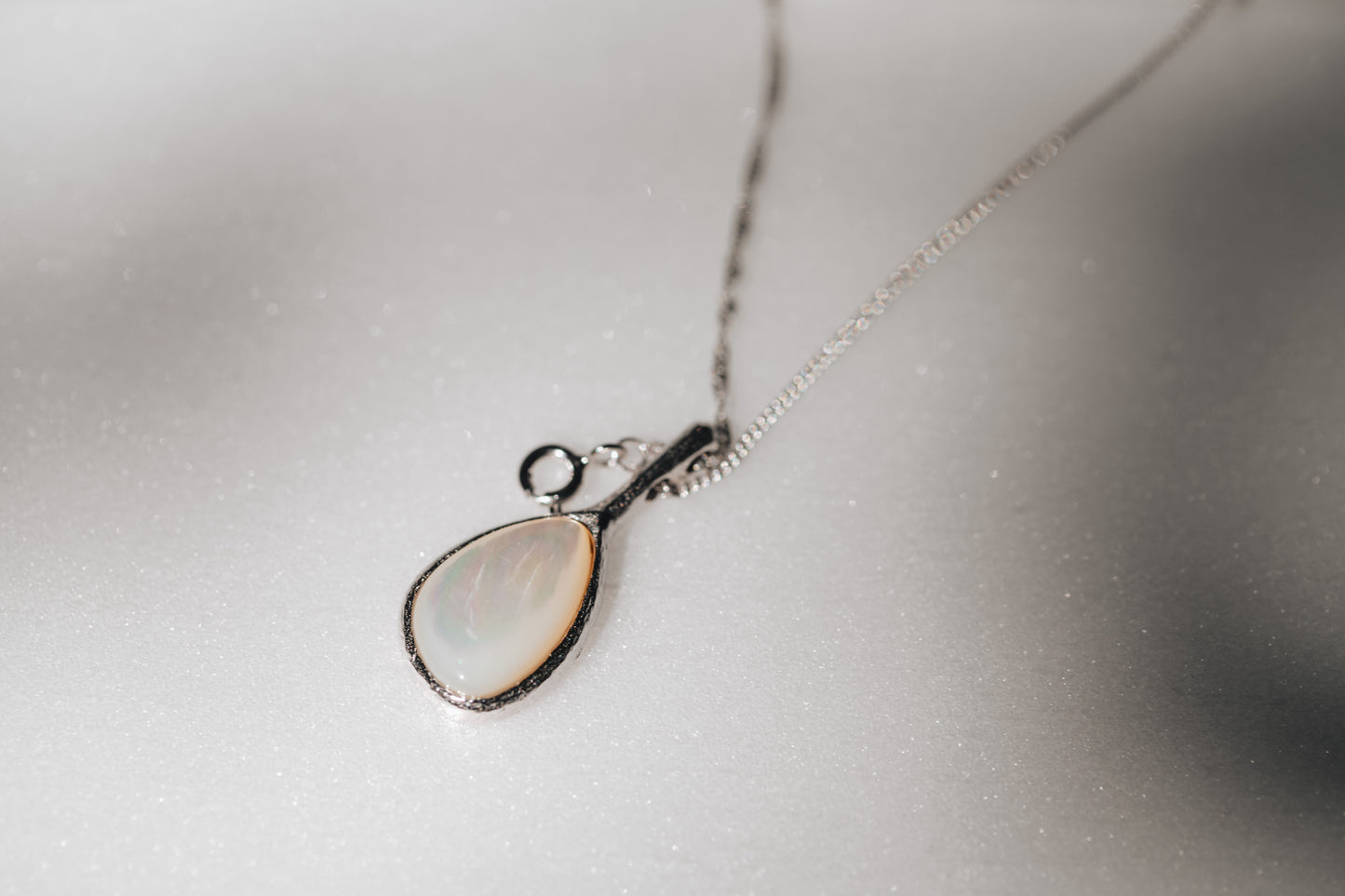 The Luminescent Droplet Necklace